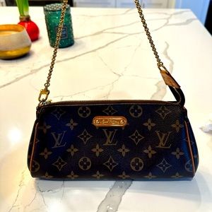 Louis Vuitton Eva handbag with shoulder strap and dust bag